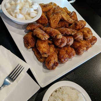 Bonchon Natomas - 30 piece Chicken wings with a side of pickled radish and steamed rice. - Korean Near Me - Sacramento, California Bonchon Natomas - 30 piece Chicken wings with a side of pickled radish and steamed rice. - Korean Near Me - Sacramento, California