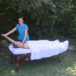 Elite Healing - A relaxing massage outside under the oak tree.
