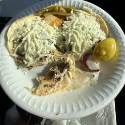 Assad tacos with extra cheese and sour cream Assad tacos with extra cheese and sour cream