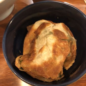 Qi Austin - Onion bread that comes with curry seafood for dipping. - Dim Sum Near Me - Austin, Texas Qi Austin - Onion bread that comes with curry seafood for dipping. - Dim Sum Near Me - Austin, Texas