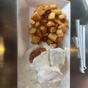 Taco Felix 2 - Chicken biscuit smothered in gravy with a side of home fries. - Breakfast & Brunch Near Me - Southaven, Mississippi Taco Felix 2 - Chicken biscuit smothered in gravy with a side of home fries. - Breakfast & Brunch Near Me - Southaven, Mississippi