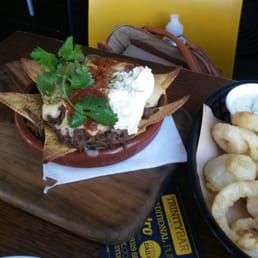 Bit of feed. Onion rings and pulled beef nachos with mad sauces Bit of feed. Onion rings and pulled beef nachos with mad sauces