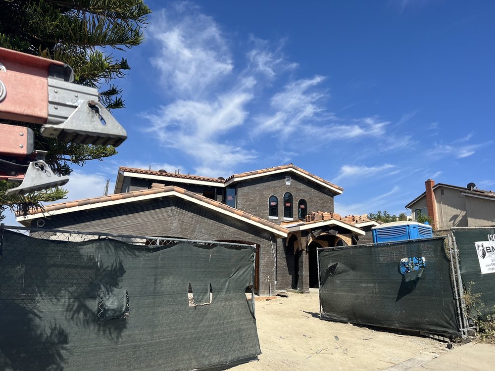 Slide of ARM Roofing Specialists