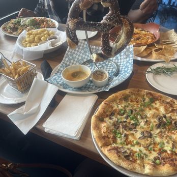 Yard House - Cheese curds Mushroom truffle pizza  Chicken Nachos Fried Chicken Tenders Cheese curds - New American Near Me - Cincinnati, Ohio