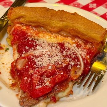 Gino's East - Magnificent Mile - Medium Deep-Chicago Fire - Pizza Near Me - Chicago, Illinois Gino's East - Magnificent Mile - Medium Deep-Chicago Fire - Pizza Near Me - Chicago, Illinois
