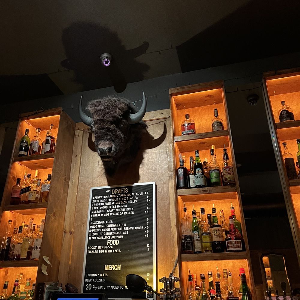 The High Lonesome - a bull head mounted on the wall - Whiskey Bars Near Me - Denver, Colorado