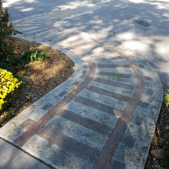 Tulip Trestle Observation Deck - cool track inlay on the sidewalk - Local Flavor Near Me - Bloomfield, Indiana Tulip Trestle Observation Deck - cool track inlay on the sidewalk - Local Flavor Near Me - Bloomfield, Indiana