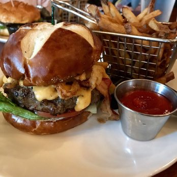 The Hangry Bison - The Trashley. A shortrib burger, beer cheese, bacon, onion straws, bibb lettuce, tomato, Texas toast - New American Near Me - Winter Park, Florida The Hangry Bison - The Trashley. A shortrib burger, beer cheese, bacon, onion straws, bibb lettuce, tomato, Texas toast - New American Near Me - Winter Park, Florida