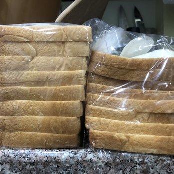 Cafe Trois - Same store, two different sizes on two bags of milk bread - Breakfast & Brunch Near Me - Fort Lee, New Jersey