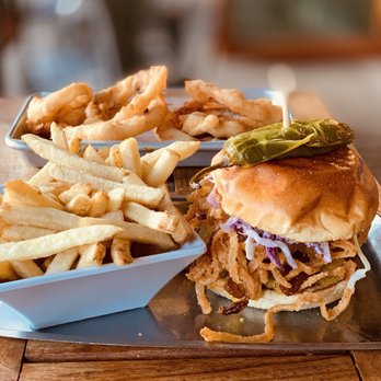 Feed Co. Burgers - Texicano with fries and onion rings. - Burgers Near Me - Seattle, Washington Feed Co. Burgers - Texicano with fries and onion rings. - Burgers Near Me - Seattle, Washington