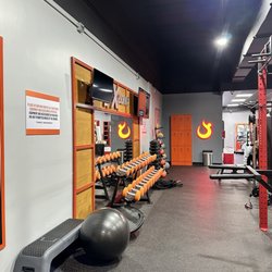 HOTWORX - Riverview - Free weights and other gym equipment.