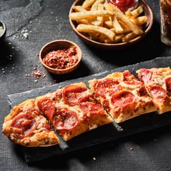 Carrabba's Italian Grill - Pepperoni Pizza available at lunch & Wednesday Pizza & Pours