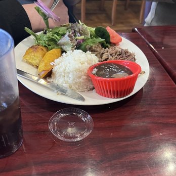 Bodega 1205 - Rice beans pork plantains, Spanish egg Benedict and plantains, corn beef hash and planta - Coffee & Tea Near Me - Columbus, Georgia