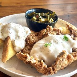 Snookies Craft Kitchen - Texas Chicken Fried Steak with mashed potatoes and collard greens.