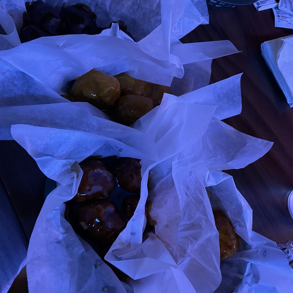 Archie's - a variety of pastries wrapped in paper - Chicken Wings Near Me - Pittsburgh, Pennsylvania