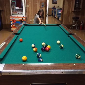 Colts Restaurant & Pizza Park - a woman playing pool - Pizza Near Me - Moorefield, West Virginia Colts Restaurant & Pizza Park - a woman playing pool - Pizza Near Me - Moorefield, West Virginia