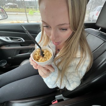 Chick-fil-A - fiona gobbling up her mac and cheese - Fast Food Near Me - Okemos, Michigan