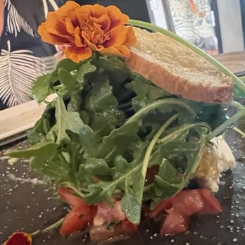 JO2 Natural Cuisine - Local honeycomb salad, creamy goat cheese, crostini, tomato, arugula - Asian Fusion Near Me - Kapaa, Hawaii