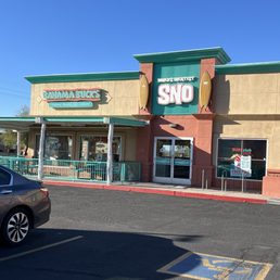 a car parked in front of a store
