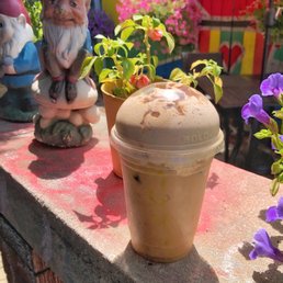 Latte with chocolate whipped cream Latte with chocolate whipped cream