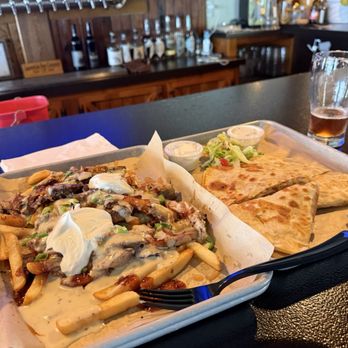 Laurentide Beer Company - Loaded Fries and Quesadilla - Breweries Near Me - Penn Yan, New York Laurentide Beer Company - Loaded Fries and Quesadilla - Breweries Near Me - Penn Yan, New York