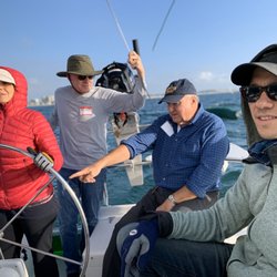 Fairwind Yacht Club - Franchesca at the helm with Safety Officer Ron Sasiela giving direction. The emphasis on safety is one of the unique benefits of this club.