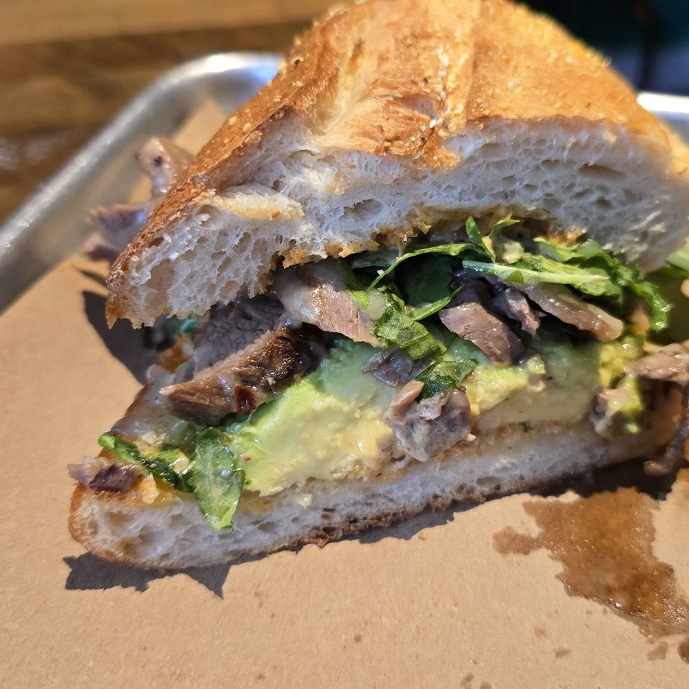 June’s Cafe - The River Mill: Flank steak | cheddar cheese | chimichurri avocado | arugula | chipotle mayonnaise | baguette - Cafes Near Me - Newmarket, New Hampshire June’s Cafe - The River Mill: Flank steak | cheddar cheese | chimichurri avocado | arugula | chipotle mayonnaise | baguette - Cafes Near Me - Newmarket, New Hampshire