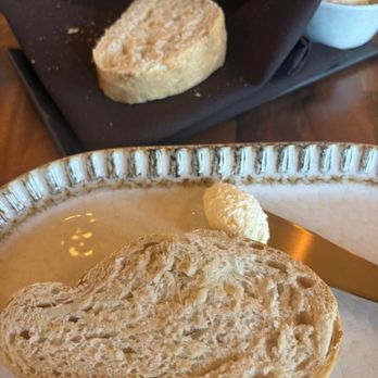Amici Italia - Garlic bread. The garlic is cooked into the bread. The garlic is not high quality and the bake on the loaf was not correct. - Italian Near Me - Cherokee, North Carolina