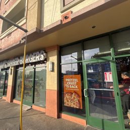Exterior outside entrance of Little Caesars - Front of store - Honolulu, Hawaii Exterior outside entrance of Little Caesars - Front of store - Honolulu, Hawaii