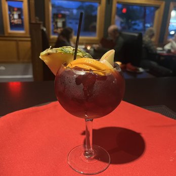 Tony's Fusion North - a red cocktail with a garnish garnish - Asian Fusion Near Me - Mattituck, New York Tony's Fusion North - a red cocktail with a garnish garnish - Asian Fusion Near Me - Mattituck, New York