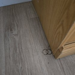Gross rusted stains from previous furniture in bedroom?