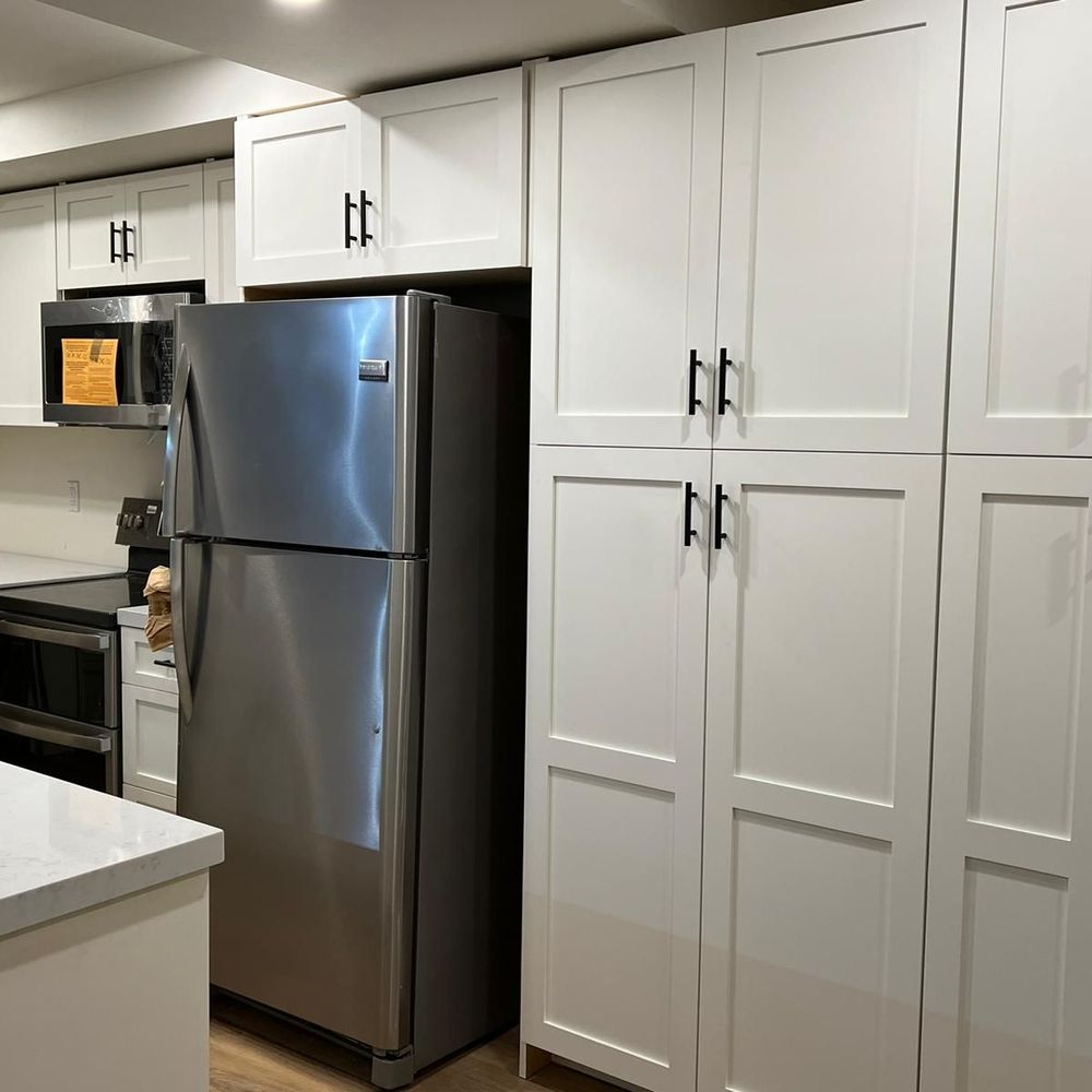 Old fridge we replaced with standard depth that hung 12  inches out from counter