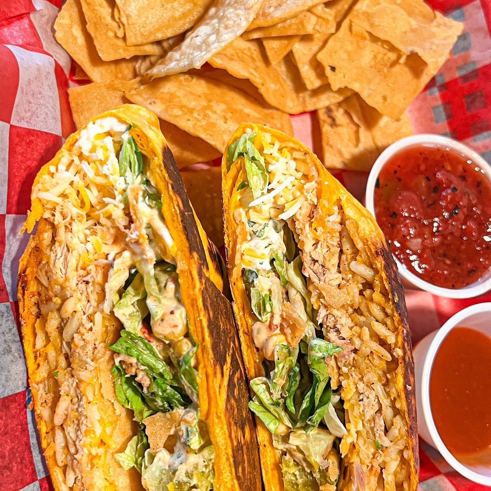 Baja Grill - two burritos and chips - Mexican Near Me - Holland, Michigan Baja Grill - two burritos and chips - Mexican Near Me - Holland, Michigan