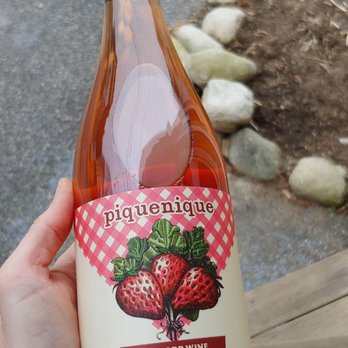Eighteen Twenty Wines - a person holding a bottle of wine - Wine Tasting Room Near Me - Portland, Maine Eighteen Twenty Wines - a person holding a bottle of wine - Wine Tasting Room Near Me - Portland, Maine