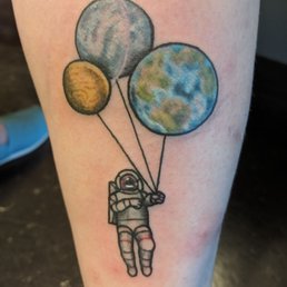 Astronaut tattoo done by Meredith Astronaut tattoo done by Meredith