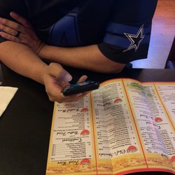 Sam's China Bistro - Handsome guy deciding what to order
