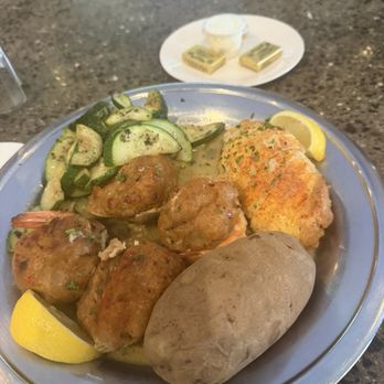 Buoy One - Seafood stuffed combo. The baked potato and zucchini were very good along with the stuffed flounder. The rest cold inside. - Seafood Near Me - Riverhead, New York Buoy One - Seafood stuffed combo. The baked potato and zucchini were very good along with the stuffed flounder. The rest cold inside. - Seafood Near Me - Riverhead, New York