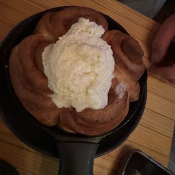 Bourbon & Baker - Bourbon Frosted Skillet Cinnamon Roll - Cocktail Bars Near Me - Manhattan, Kansas