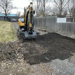Ally Construction Services - Driveway grading to allow access without trailer drag.