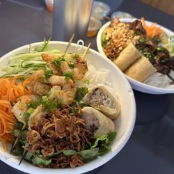 Saigon Table - Grilled shrimp vermicelli with eggroll and grilled pork from with eggroll bowls