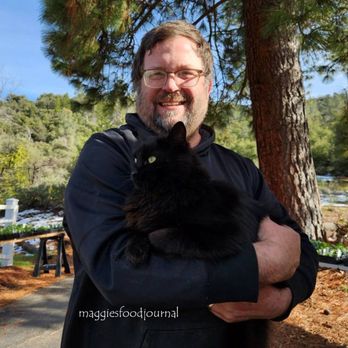 The Farm at Worman Mill - 2025 Mar 16: Adam and one of his working farm cats - Farmers Market Near Me - Ahwahnee, California