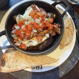Breakfast Skillet, gravy on the side, side of sour dough Breakfast Skillet, gravy on the side, side of sour dough