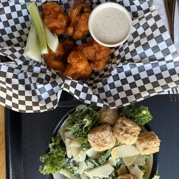 Watercourse Foods - Buffalo Cauliflower Wings & small Caesar Salad - Vegetarian Near Me - Denver, Colorado Watercourse Foods - Buffalo Cauliflower Wings & small Caesar Salad - Vegetarian Near Me - Denver, Colorado