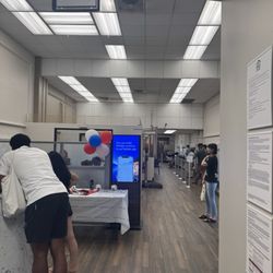 Bank of America Financial Center - Interior, huge line, rude worker near balloons