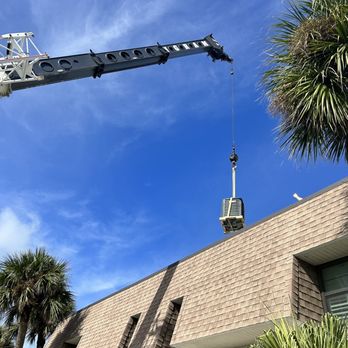 Freedom Air and Plumbing - Outside unit heading to the roof, very neat install with hurricane straps and accessories. - Heating & Air Conditioning/HVAC Near Me - Cocoa, Florida