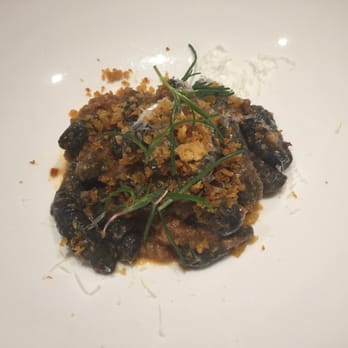 Gunshow - Calamari bolognese...doesn't look great but tasted delicious. Black squid ink cavatappi - New American Near Me - Atlanta, Georgia