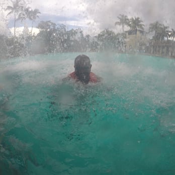 Venetian Pool - Took a picture of my cousin from inside the waterfall. - Swimming Pools Near Me - Coral Gables, Florida Venetian Pool - Took a picture of my cousin from inside the waterfall. - Swimming Pools Near Me - Coral Gables, Florida