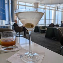 Terminal F - Atlanta Airport - Martini, extra dirty, from the Delta Sky Club bar in Concourse F at Hartsfield on Sunday, September 13, 2026. I already had a sip.