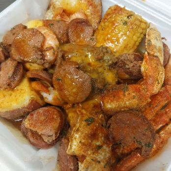 Watz Crackin - Dungeness Garlic tray - Chicken Wings Near Me - Houston , Texas Watz Crackin - Dungeness Garlic tray - Chicken Wings Near Me - Houston , Texas