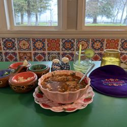 Ali’s kitchen - Menudo and. Lime Margarita with a backdrop of a stormy Clearlake